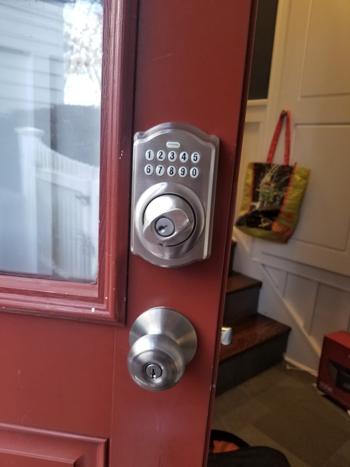 Safe locksmith Staten Island installing and anchoring a new safe